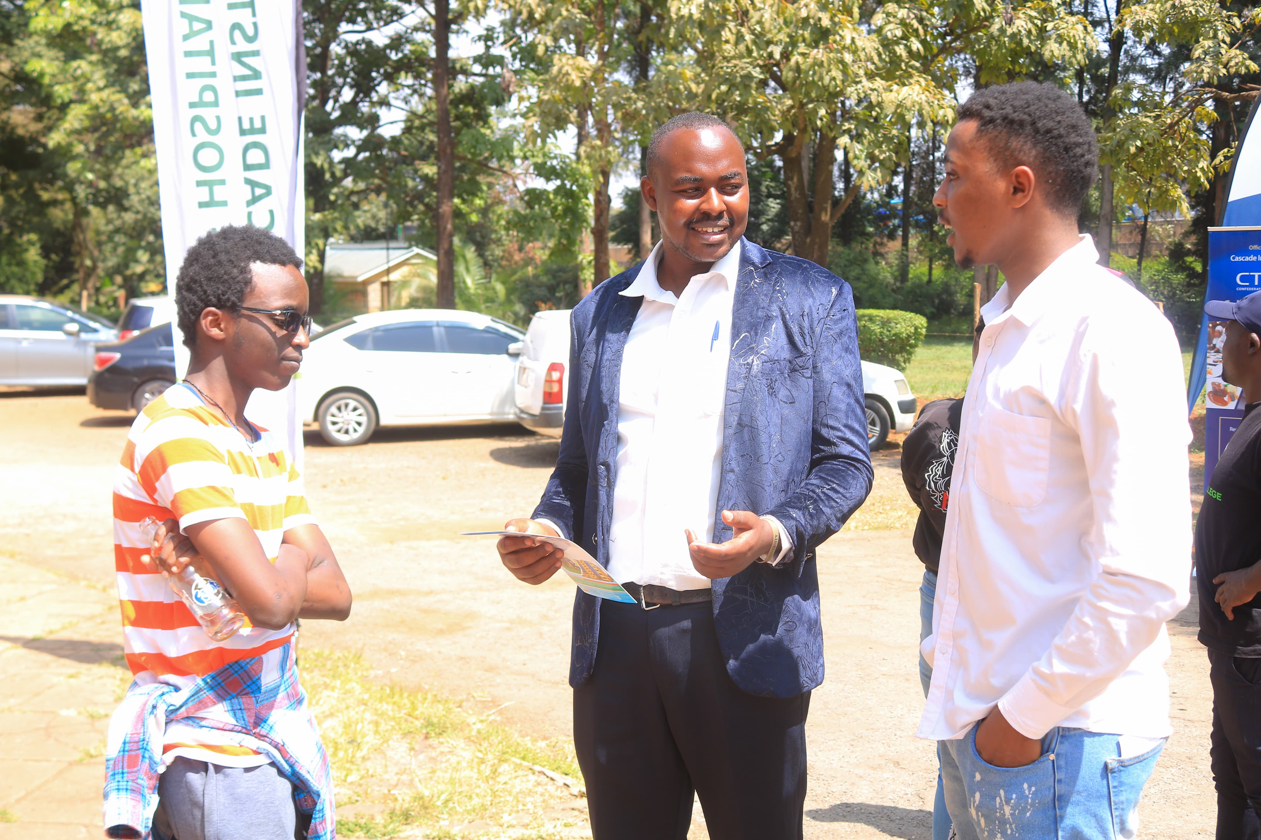 Mr. Wilfred Rutto (Chapter Coordinator) engaging with students