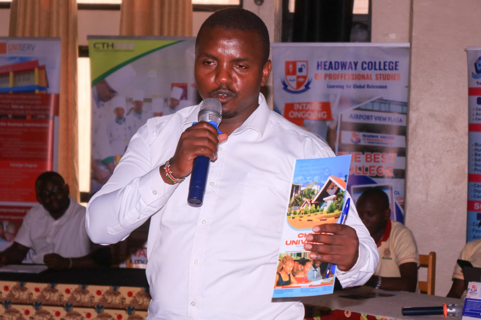 Mr. Livan Njeru(Secretary general) taking the students through the courses offered at Chuka University